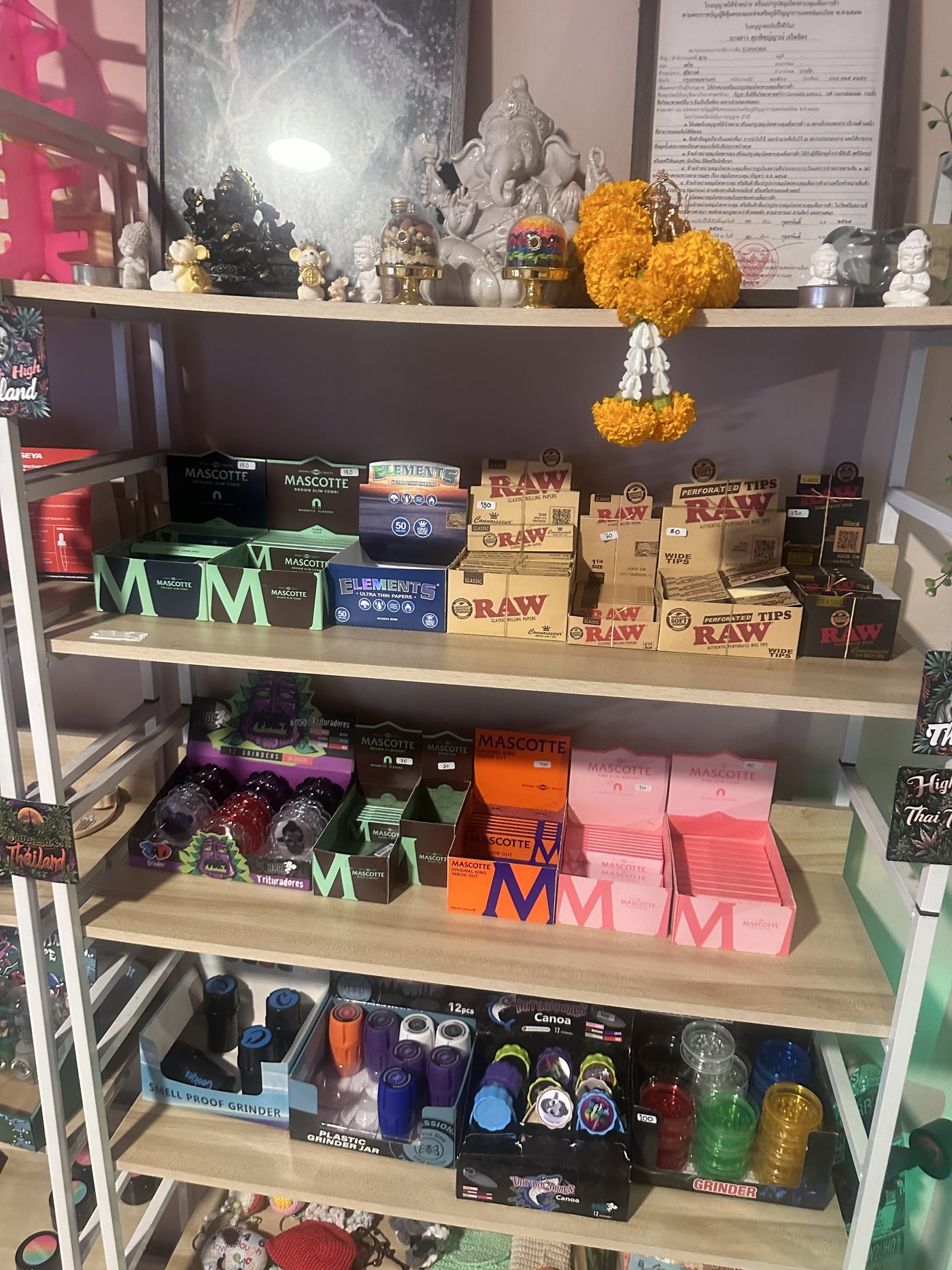 Rolling papers and smoking accessories on display at Euphoria dispensary